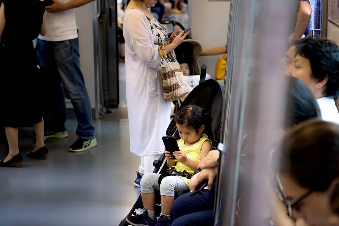 A Toddler On A Stroller