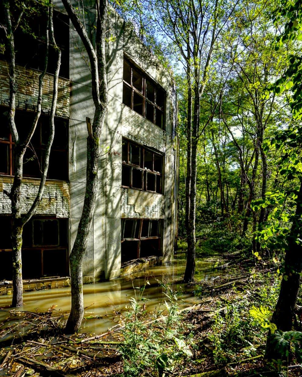 round schoolhouse building ruins haunted places in Japan