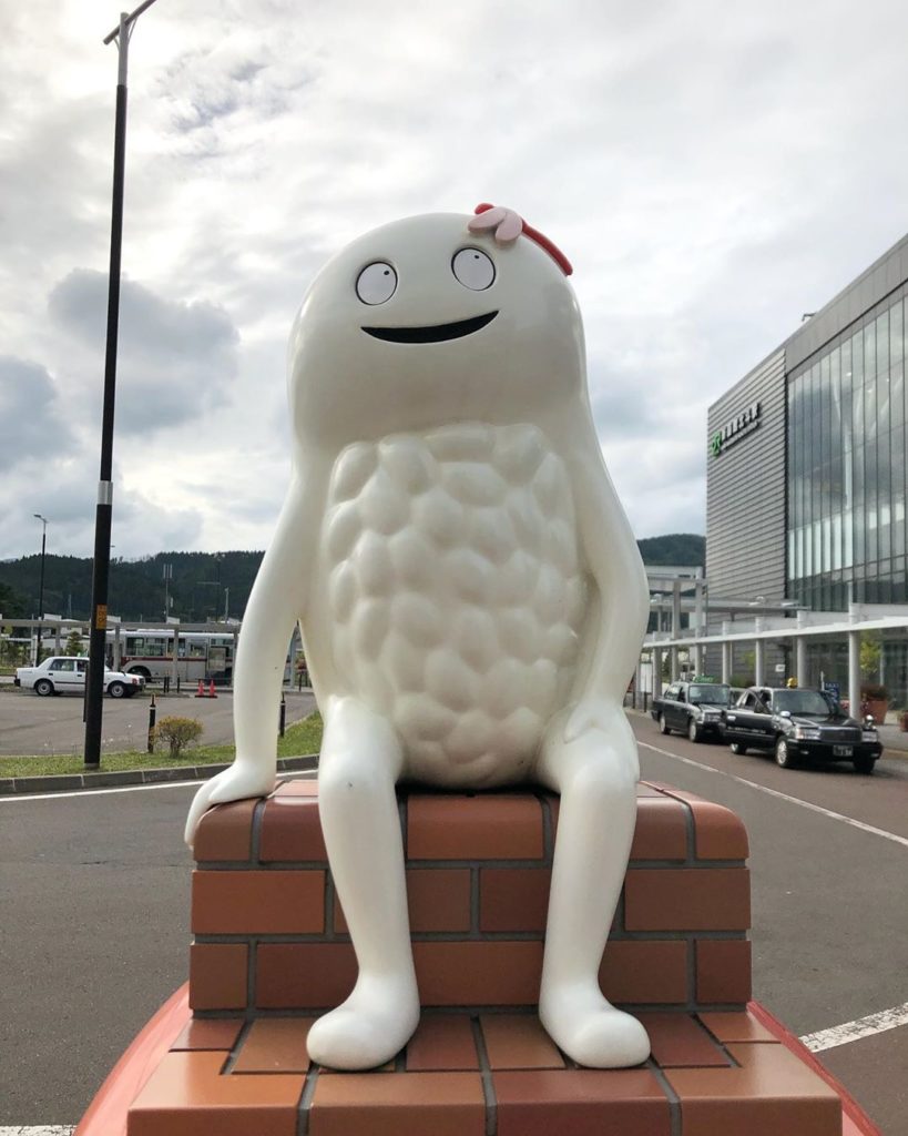 Weird Japanese mascots - Zushihocky sitting near train station
