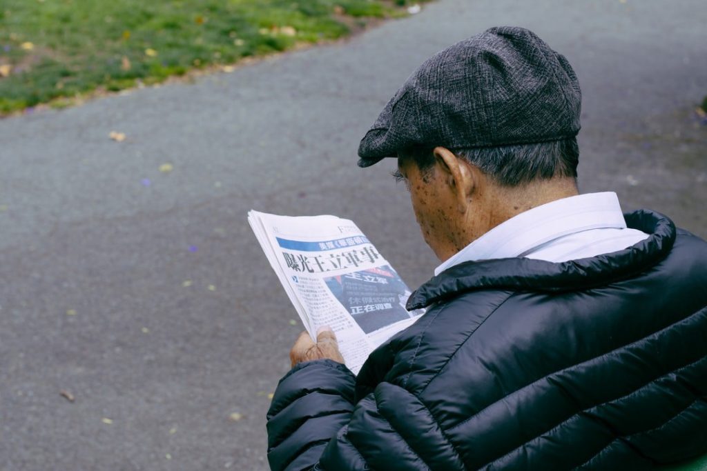 Useful Japanese tips - man reading newspaper