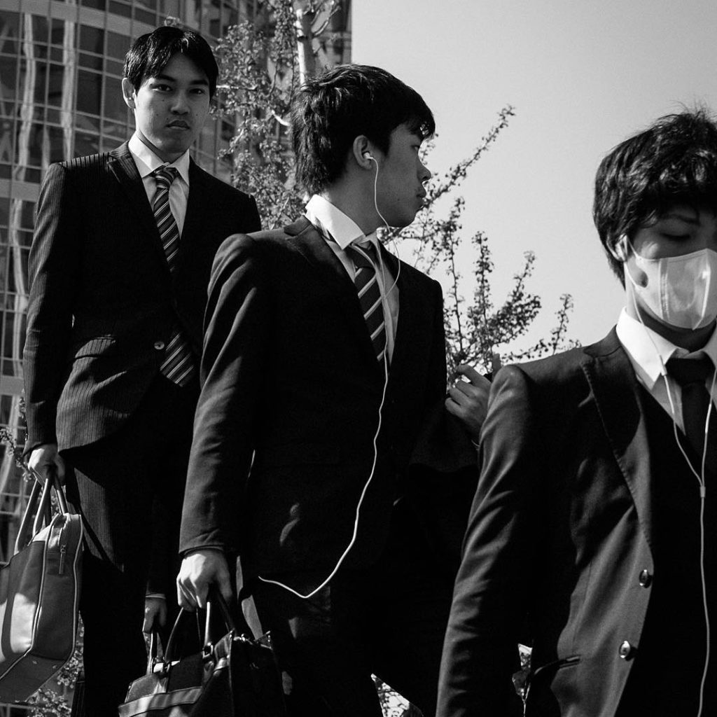 Mysteries in Japan - salarymen in black and white