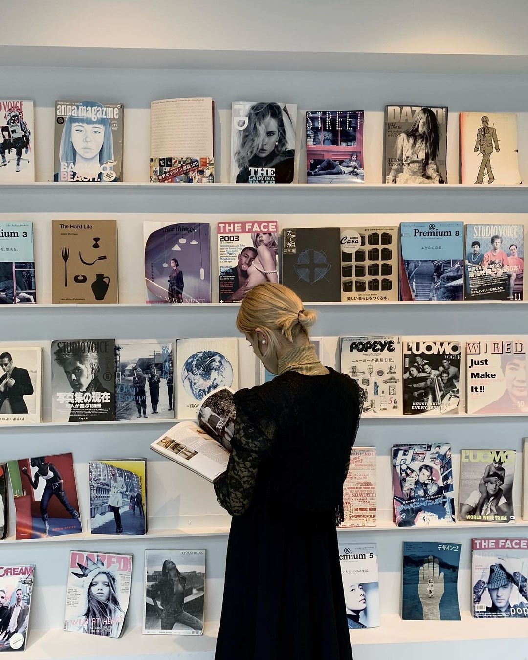 Book And Book Tokyo Shinsaibashi - A lady looking at books