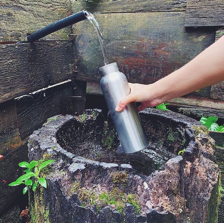 Japan travel tips - refilling bottle at a fountain