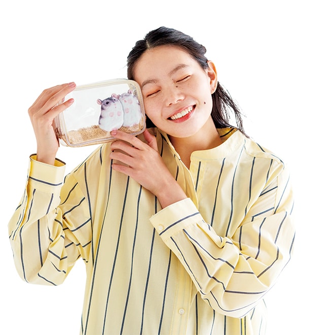 lady holding up hamster pouch