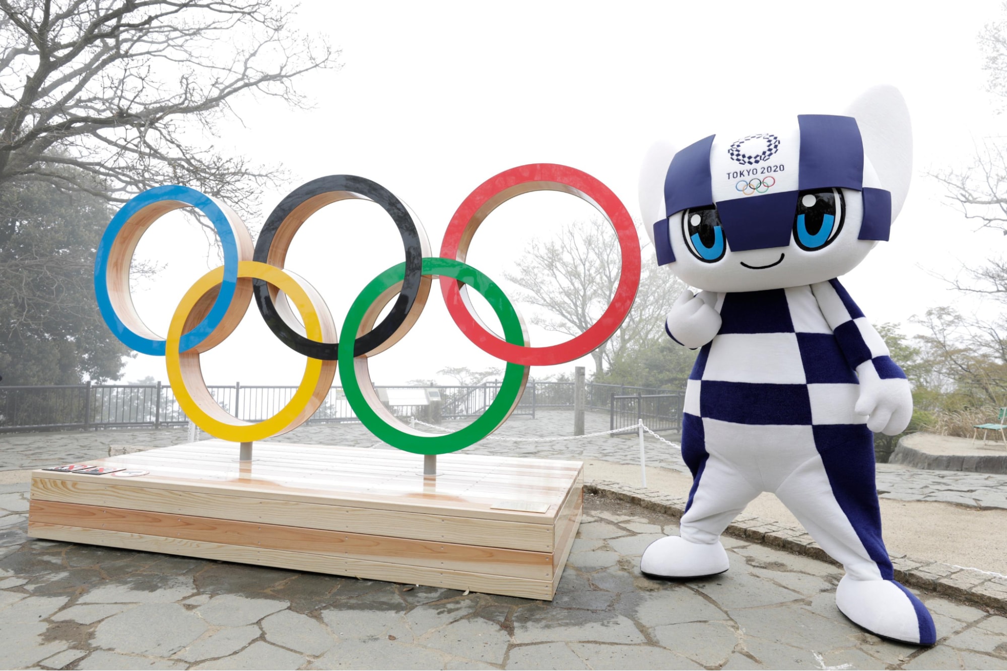 tokyo olympic mascot with rings