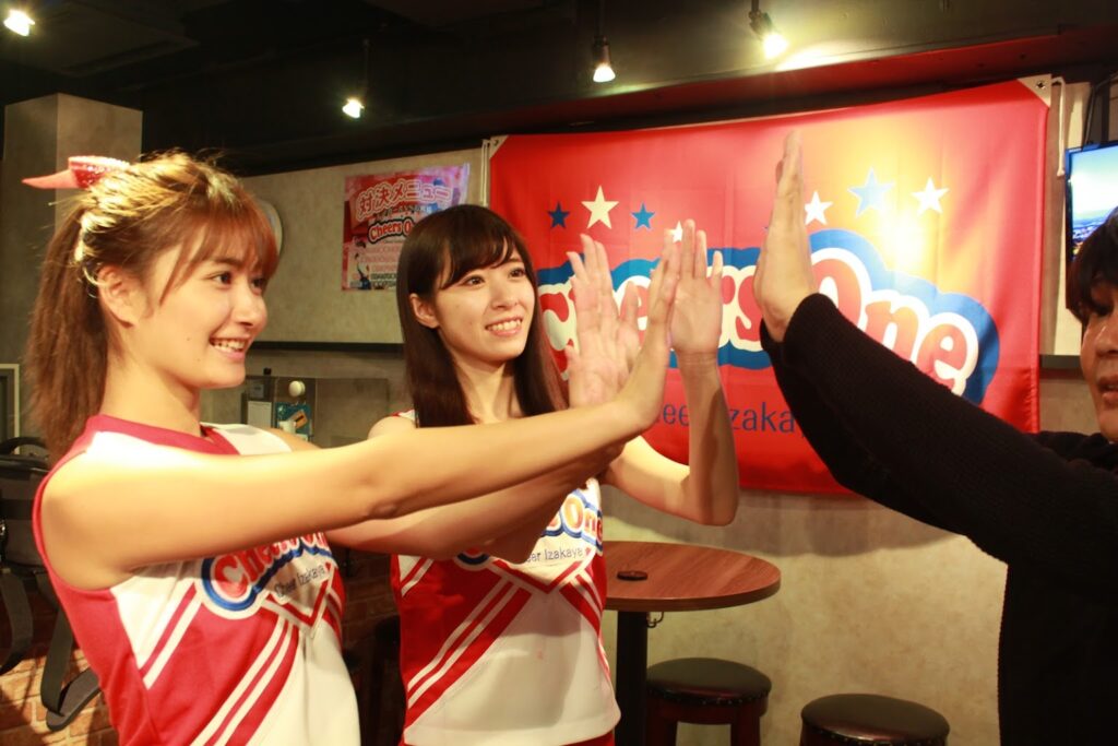 Cheers One cheerleading cafe - high-five with the cheerleaders 