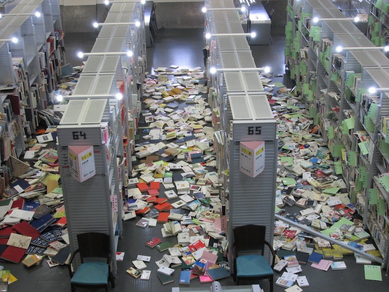Miyagi Prefectural Library closes - books piled on the floor