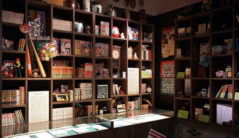 Toshio Suzuki and Ghibli Exhibition - bookshelf