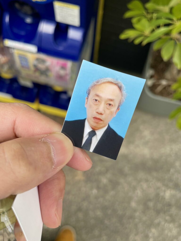 Capsule machine ID photos - passport photo of middle aged man