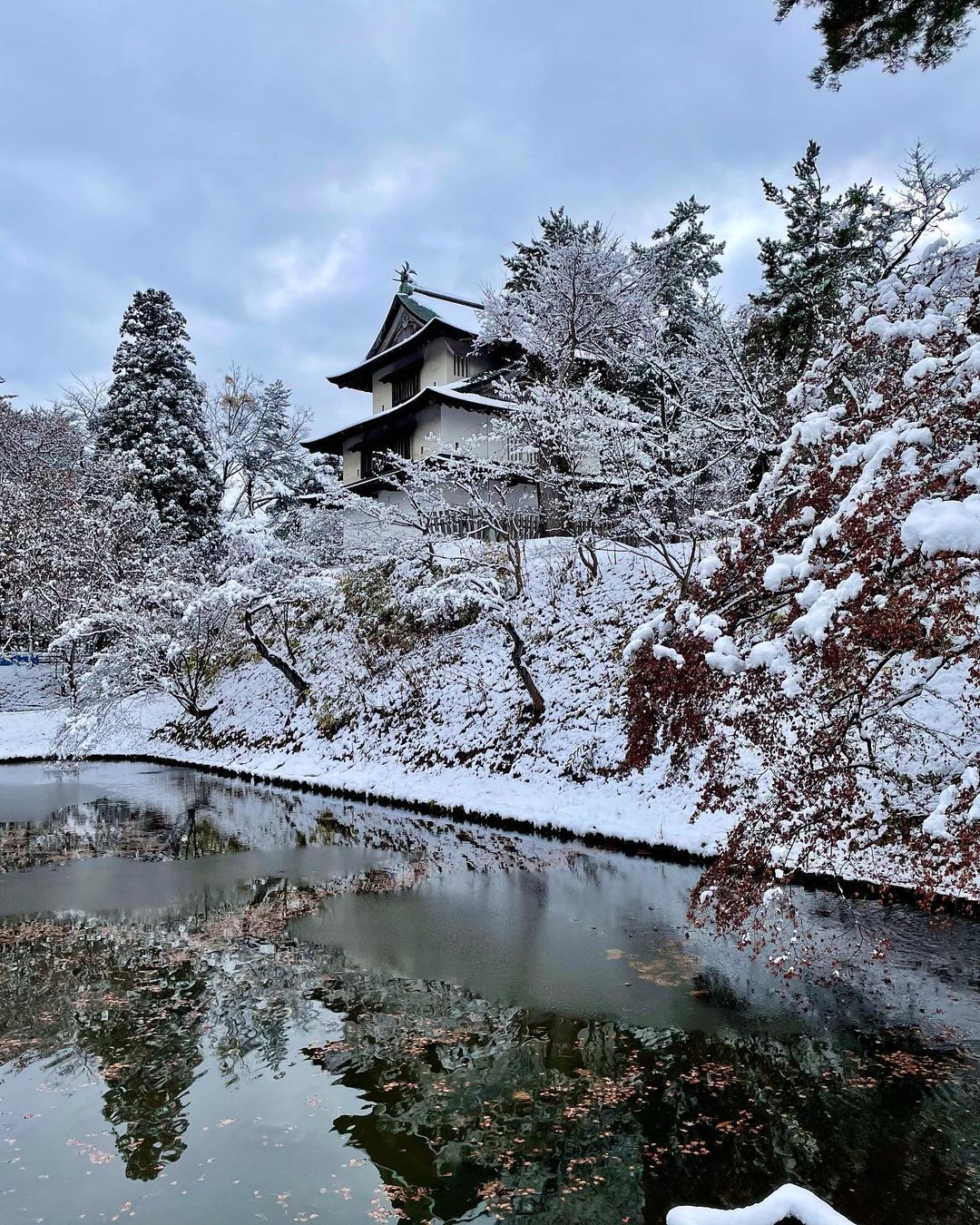 Cities in Japan to see snow - side view of Hirosaki Castle