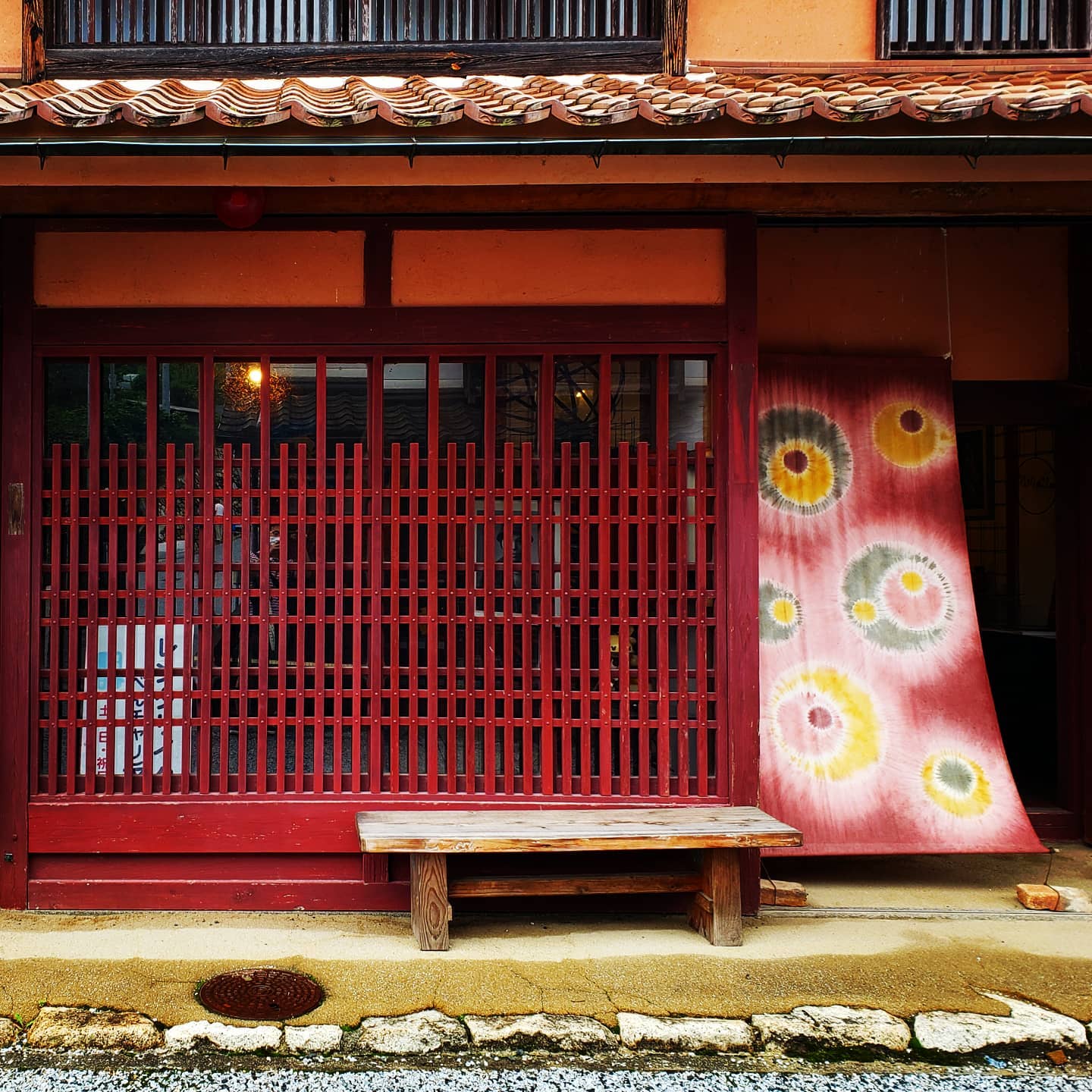 Fukiya Furusato Village - buildings with walls and window lattices painted with bengara pigment