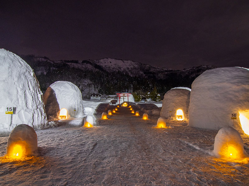 Iiyama Kamakura Village - snow huts with lights